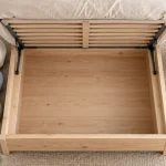 Sommier coffre 160x200 : rangement 978 L sous le cadre